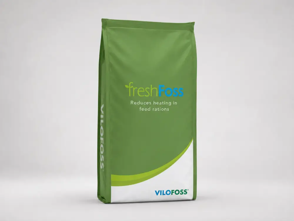 A green freshFoss bag, photographed against a plain grey studio background.