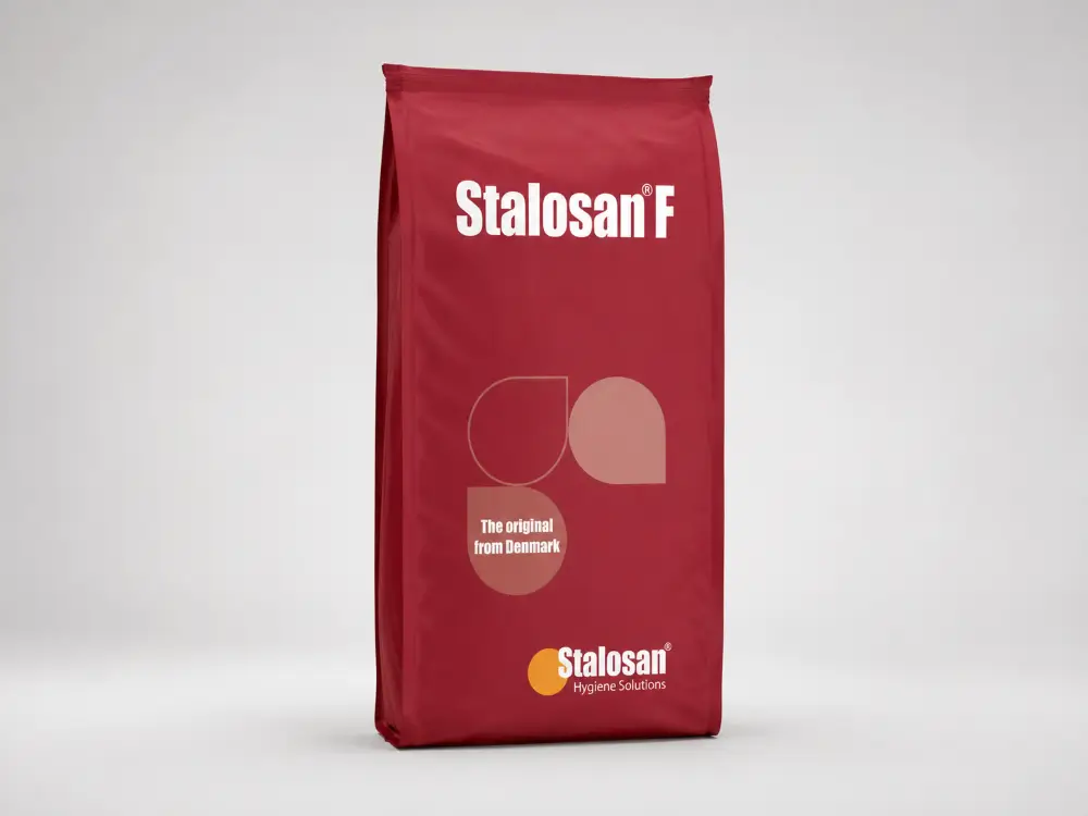 A red Stalosan F bag, photographed against a plain grey studio background.